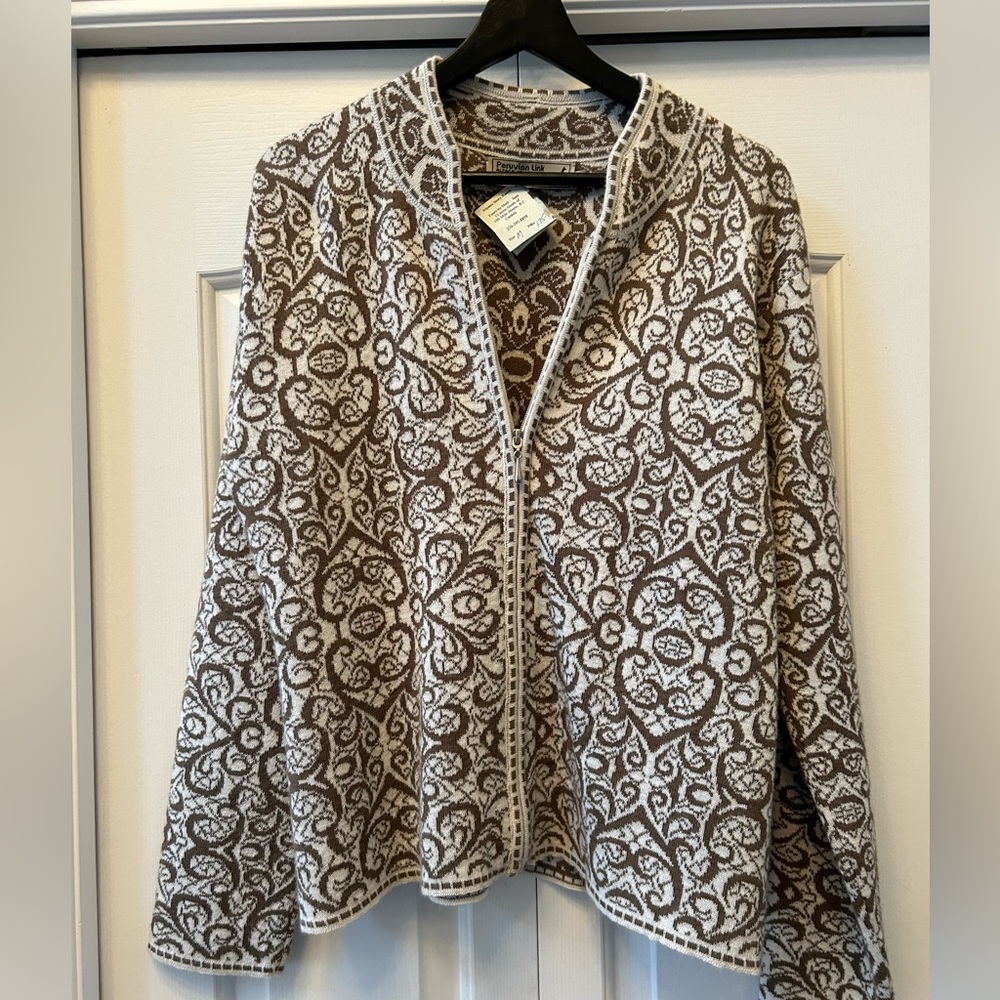 Zippered cardigan  fits 12-14  plenty of length in sleeves